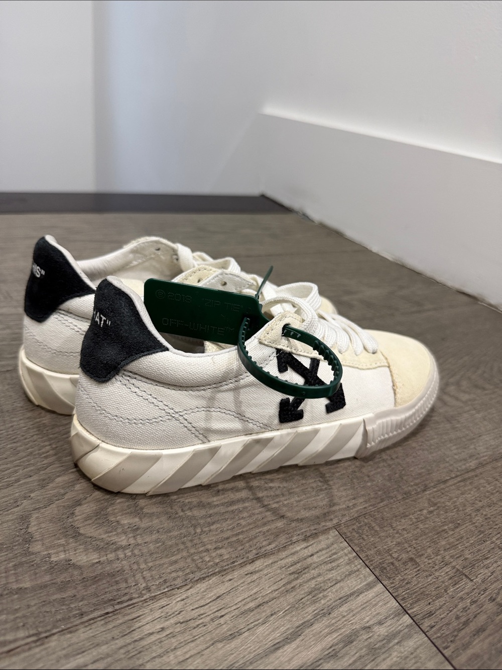 Off-White Cream and Black Low-Top Canvas Sneakers with Green Tag